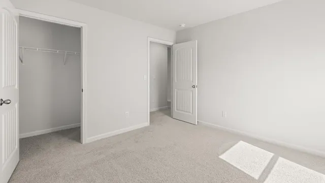 an aerial view of a house with a garden and swimming pool
