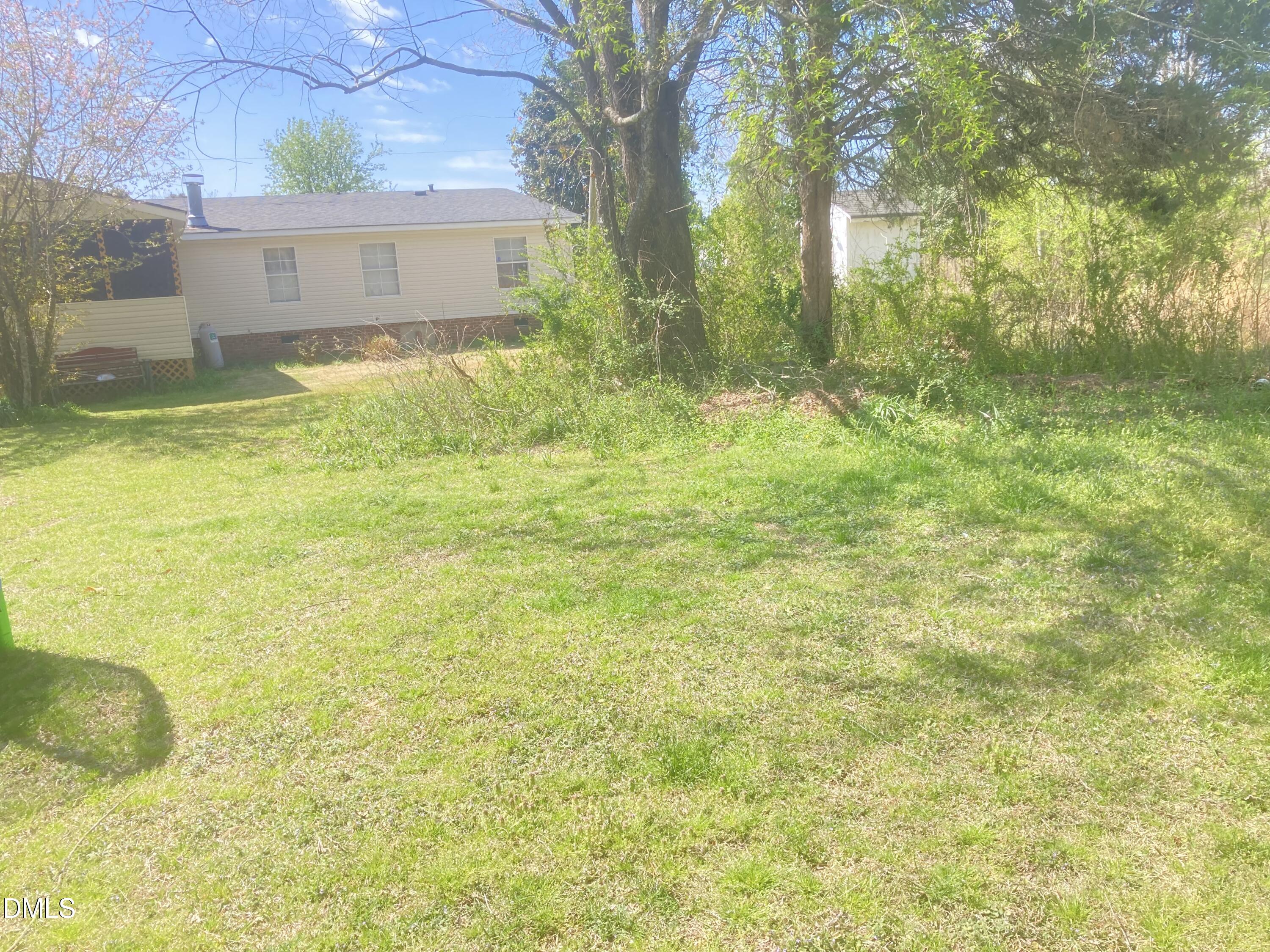 1586 Gum Swamp Church Road Greenville, NC 27834 - Photo 13 of 93 a view of a back yard of the house