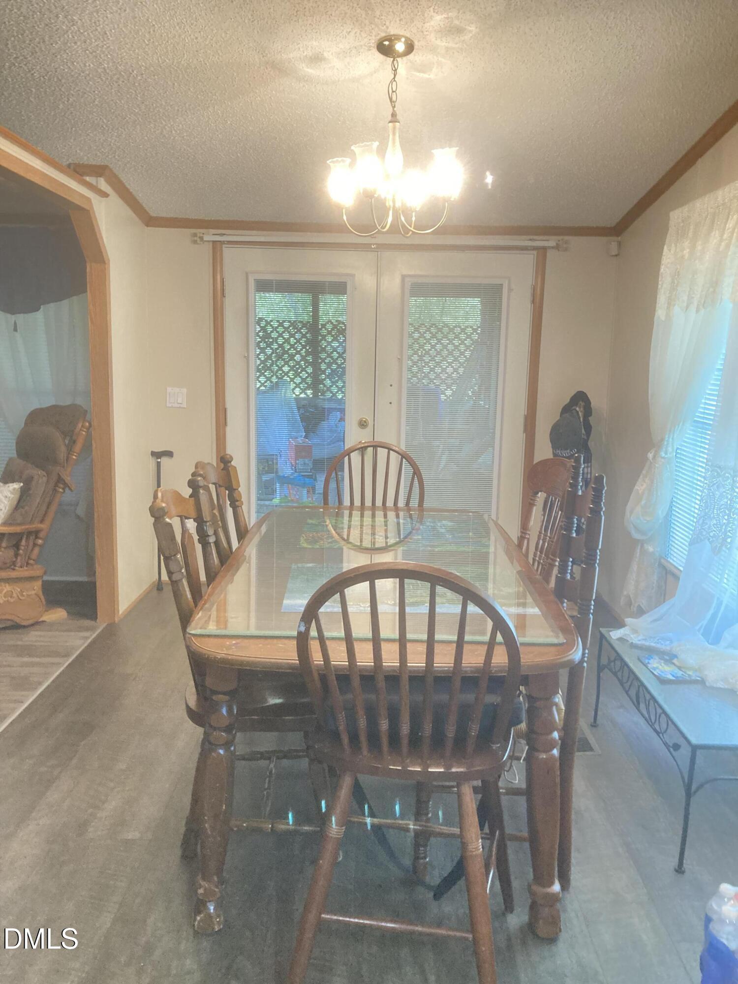1586 Gum Swamp Church Road Greenville, NC 27834 - Photo 20 of 93 a view of a dining room with furniture window and outside view