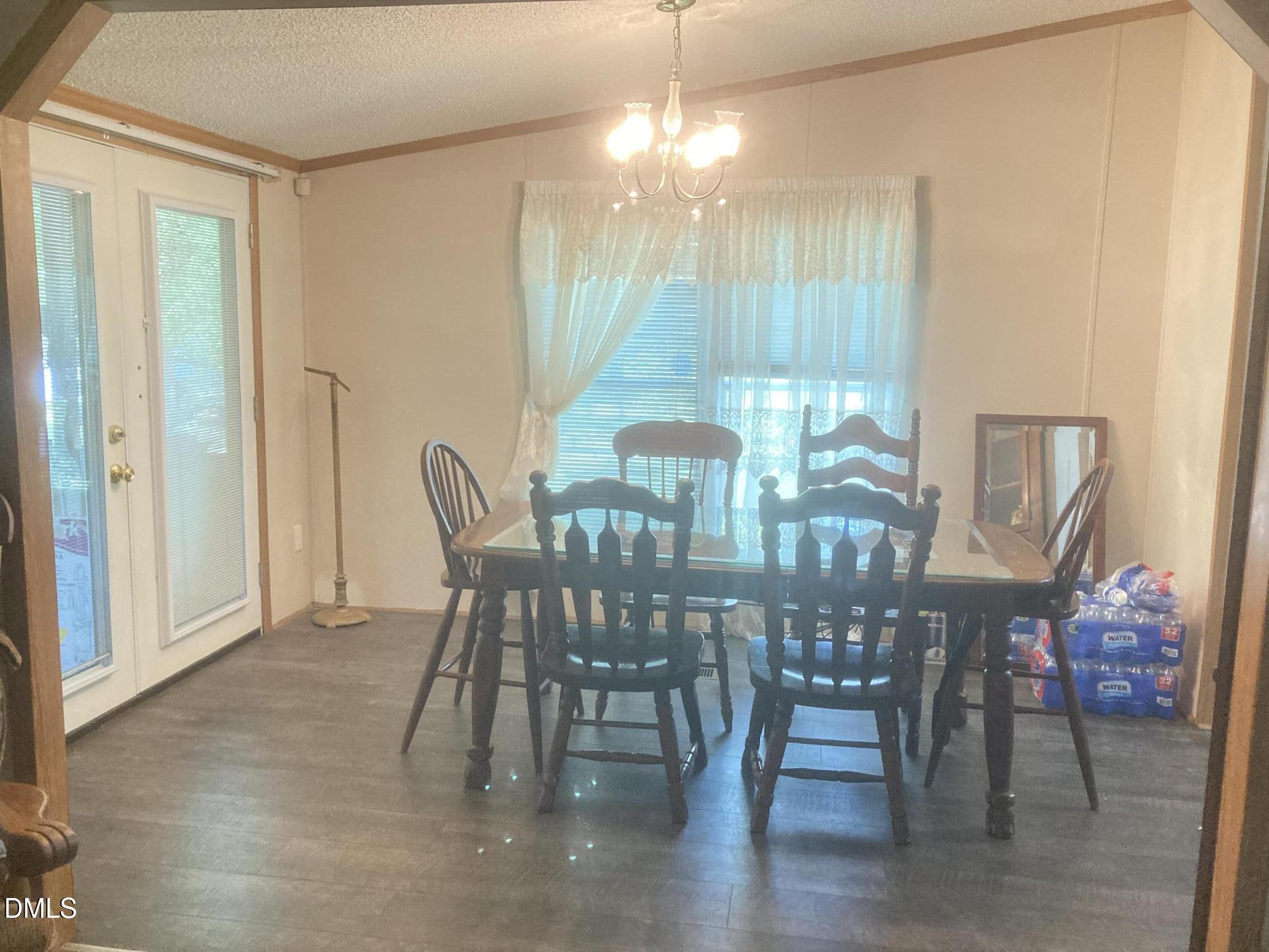 1586 Gum Swamp Church Road Greenville, NC 27834 - Photo 24 of 93 a view of a dining room with furniture window and outside view