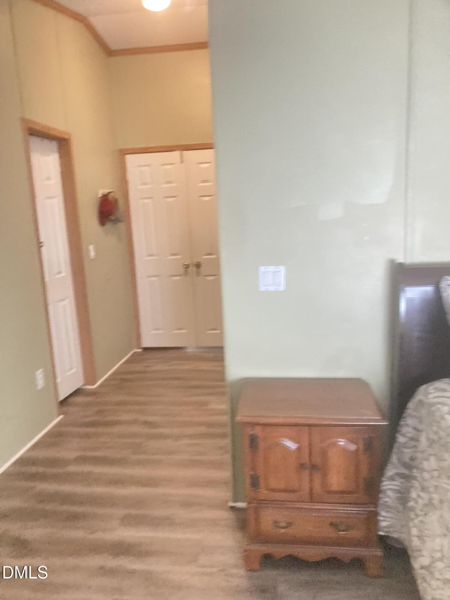 1586 Gum Swamp Church Road Greenville, NC 27834 - Photo 61 of 93 a view of empty room with wooden floor