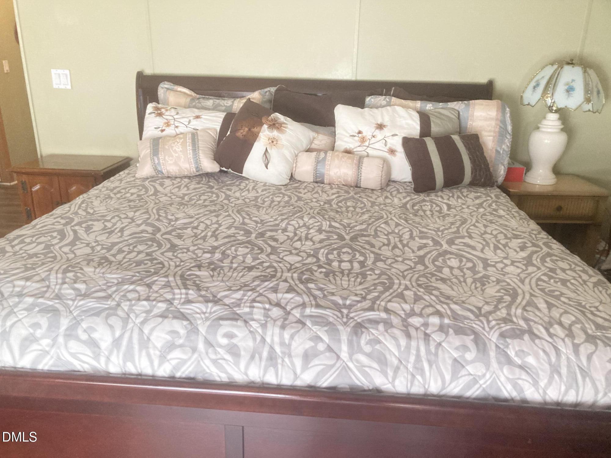 1586 Gum Swamp Church Road Greenville, NC 27834 - Photo 63 of 93 a large white bed in a white room