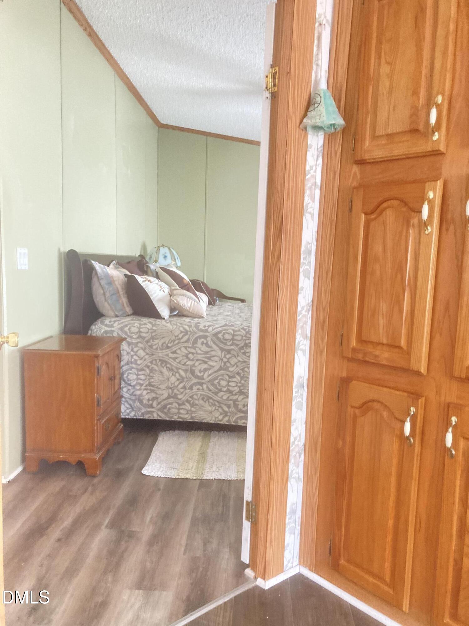 1586 Gum Swamp Church Road Greenville, NC 27834 - Photo 64 of 93 a living room with furniture and a window
