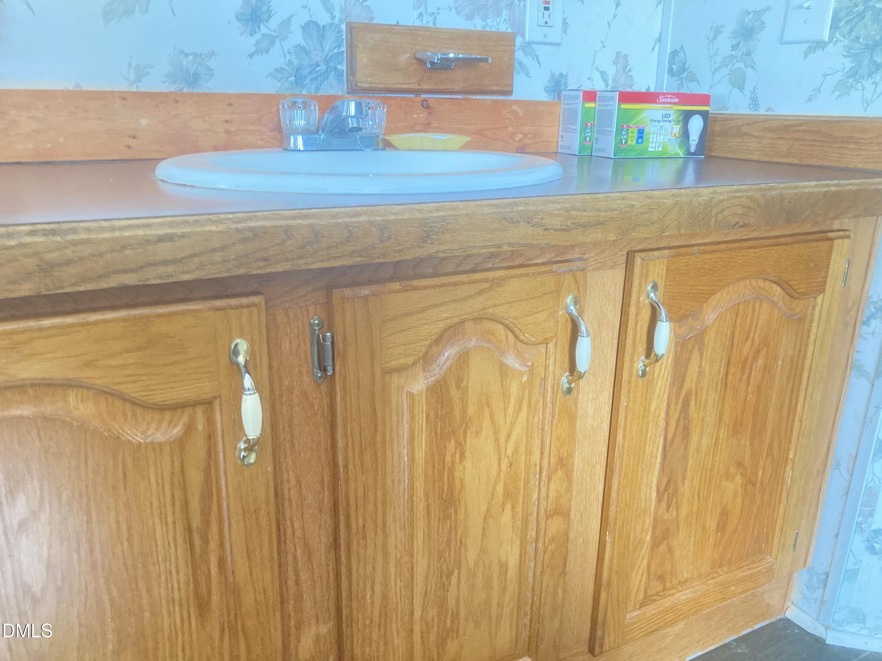 1586 Gum Swamp Church Road Greenville, NC 27834 - Photo 69 of 93 a bathroom with a sink