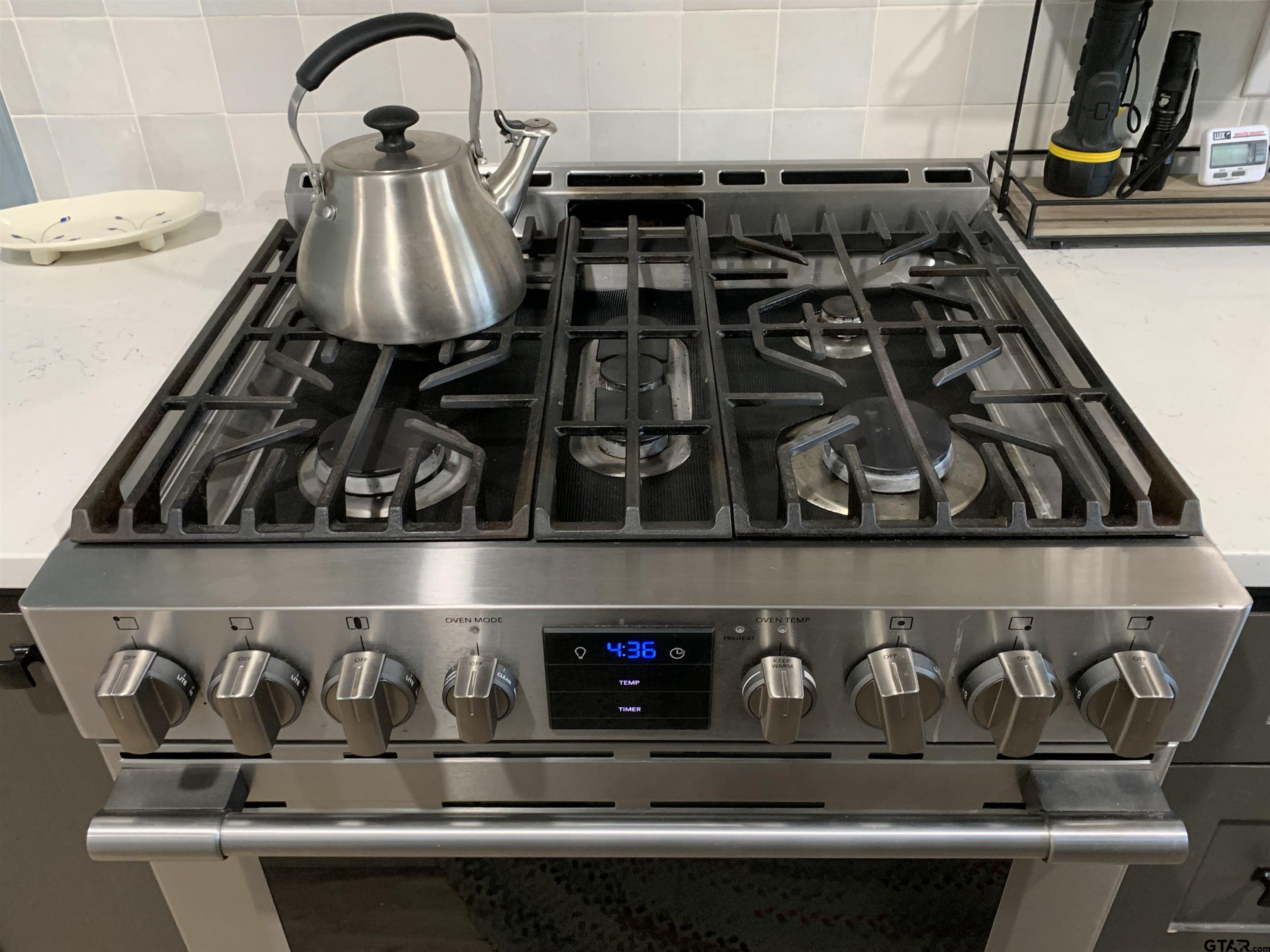 800 Neches Drive Tyler, TX 75702 - Photo 12 of 26 a close view of water heater