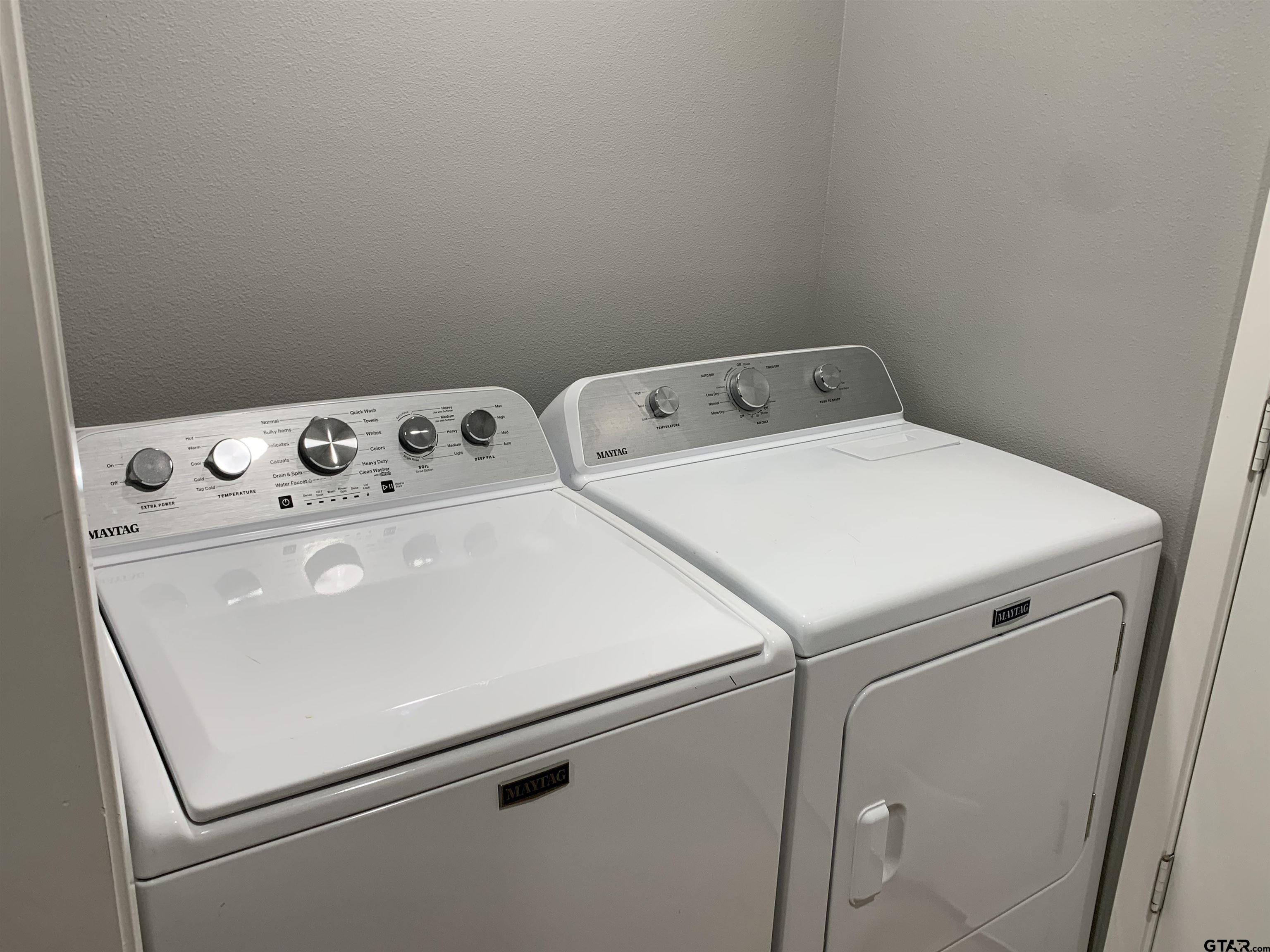 800 Neches Drive Tyler, TX 75702 - Photo 13 of 26 a utility room with dryer and washer