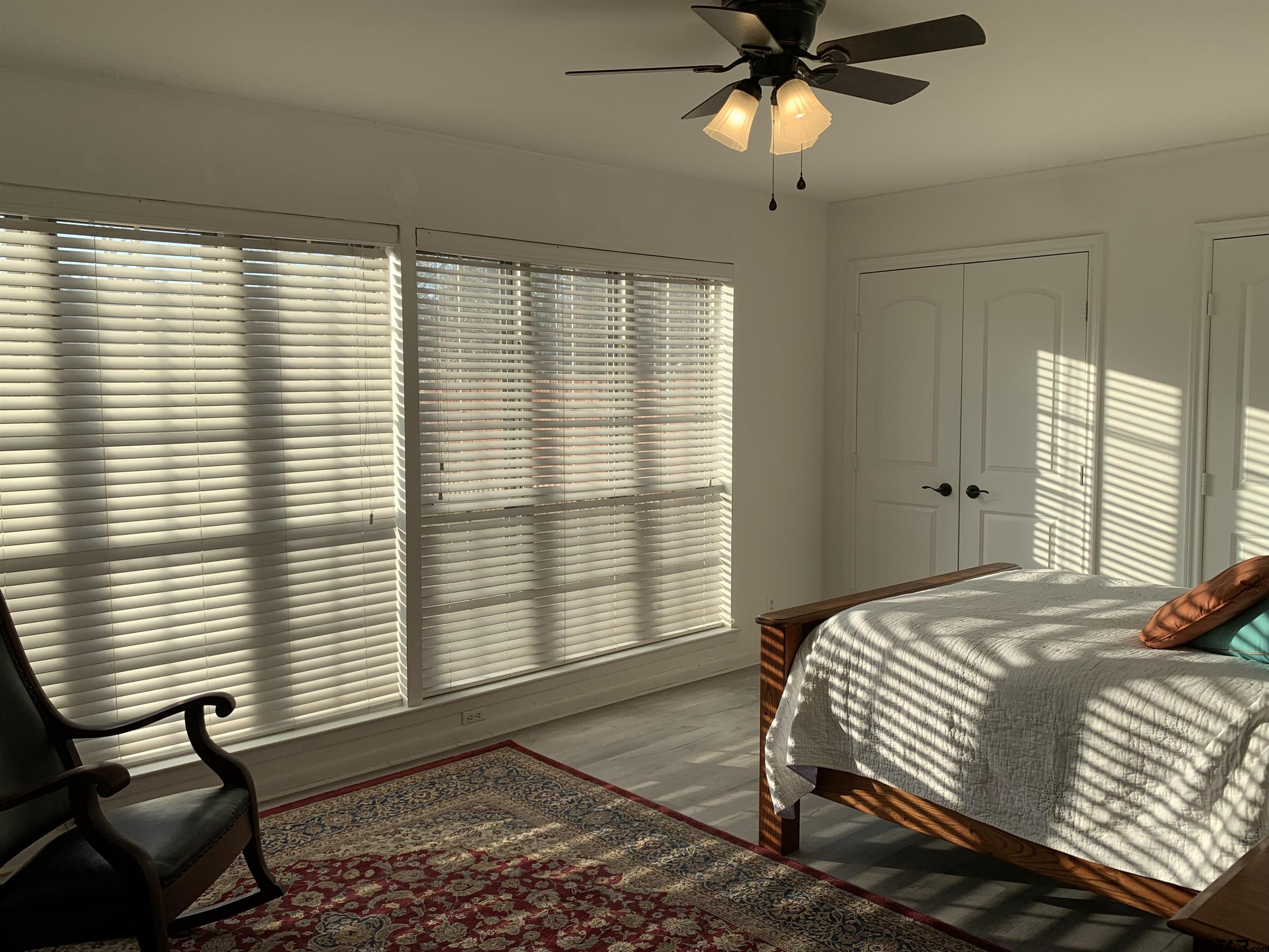 800 Neches Drive Tyler, TX 75702 - Photo 16 of 26 a bedroom with a bed and a window