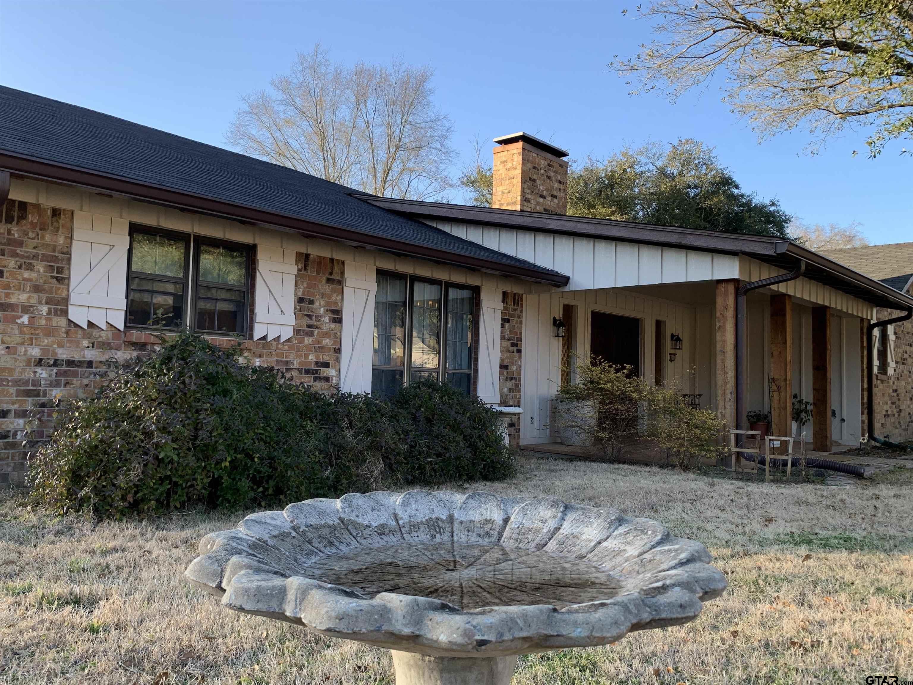 800 Neches Drive Tyler, TX 75702 - Photo 2 of 26 a view of a house with outdoor space