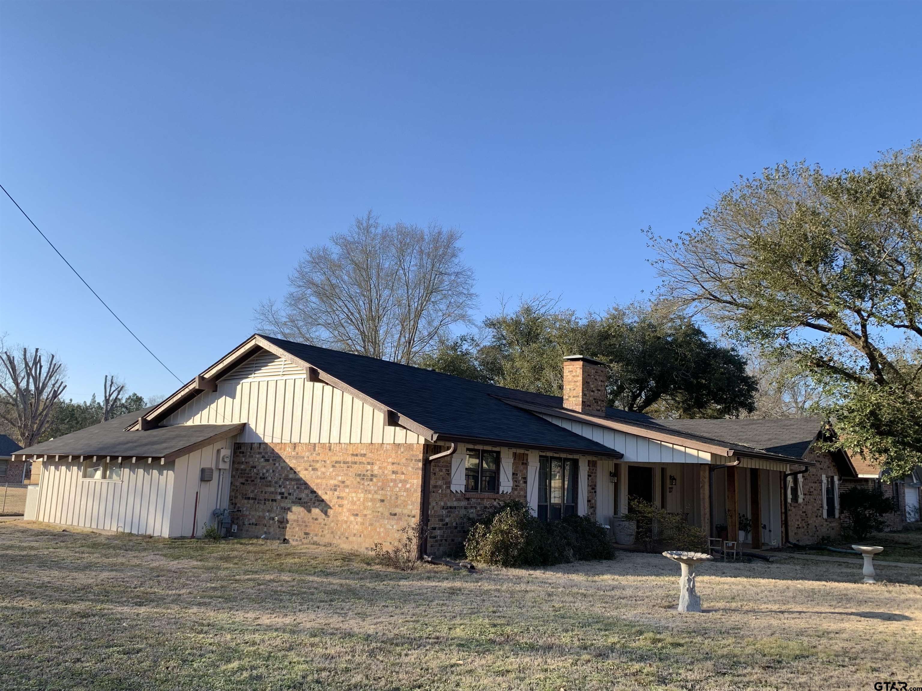 800 Neches Drive Tyler, TX 75702 - Photo 3 of 26 a view of house with yard and entertaining space