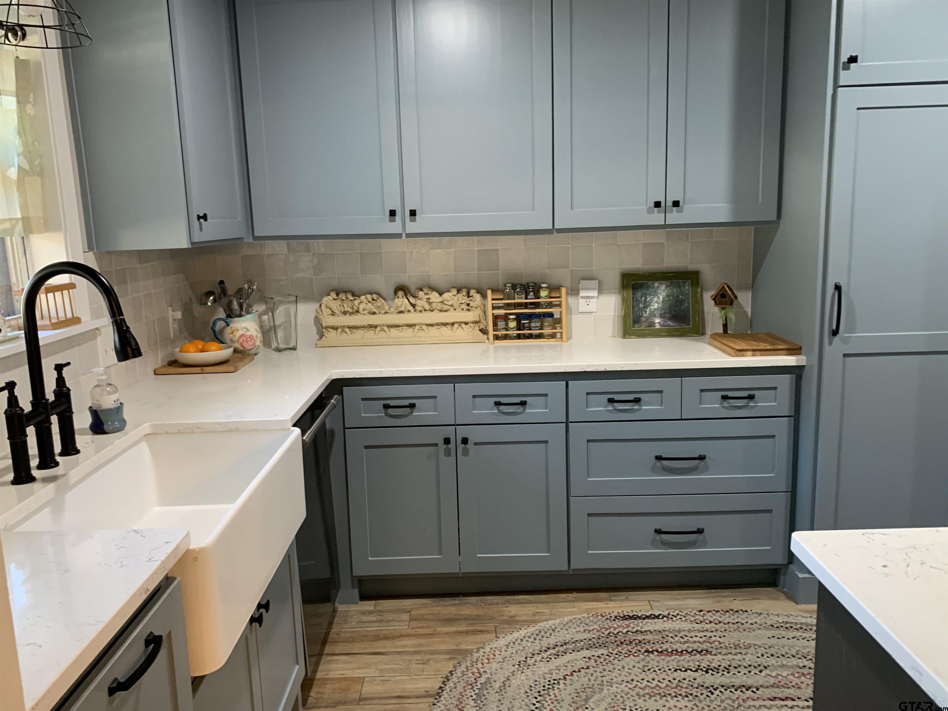 800 Neches Drive Tyler, TX 75702 - Photo 10 of 26 a view of a kitchen with cabinets