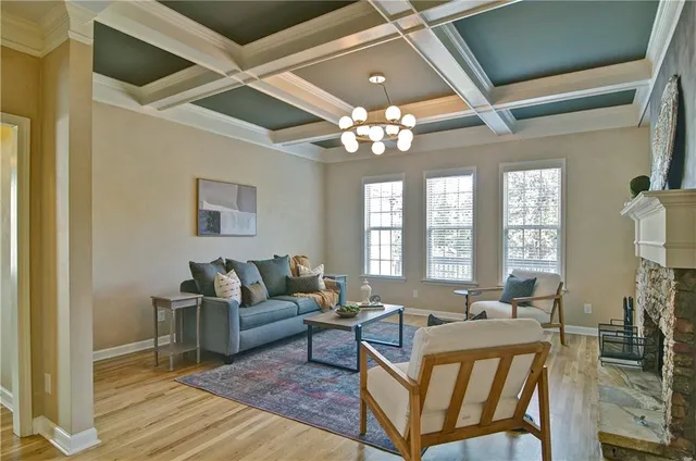 a bathroom with a sink a mirror and a shower