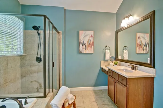 a kitchen that has a sink and a stove