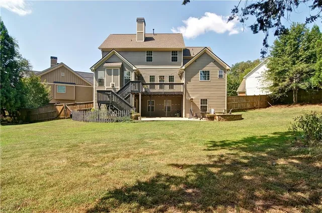 a view of house with deck