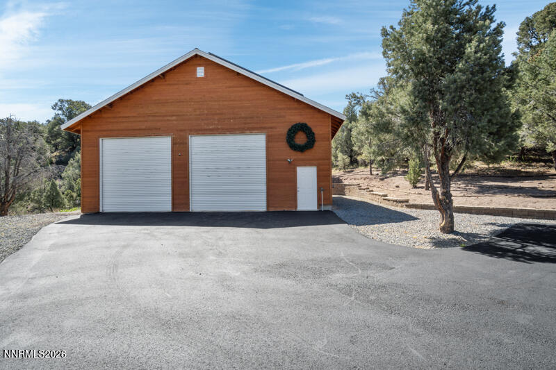 1931 Lousetown Road Reno, NV 89521 - Photo 38 of 51 a front view of a house with a yard