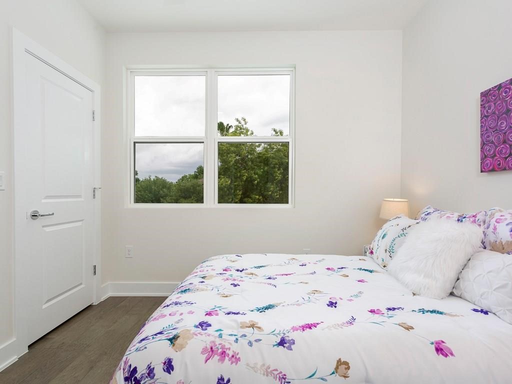 1111 Brookswood Avenue, Unit A Austin, TX 78721 - Photo 16 of 21 One of two secondary bedrooms