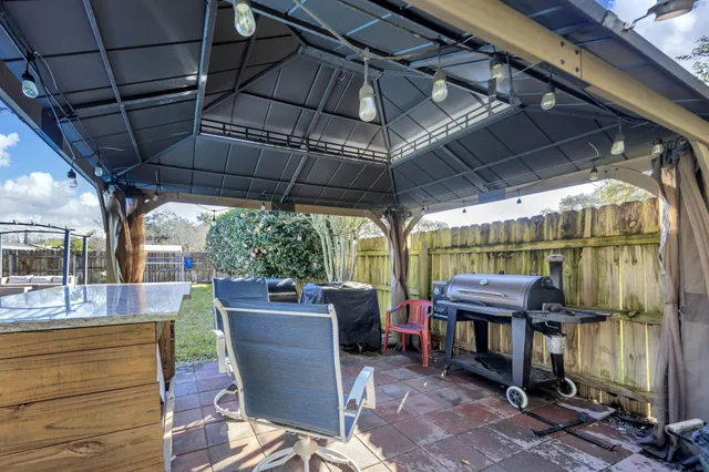 a view of a swimming pool with a deck