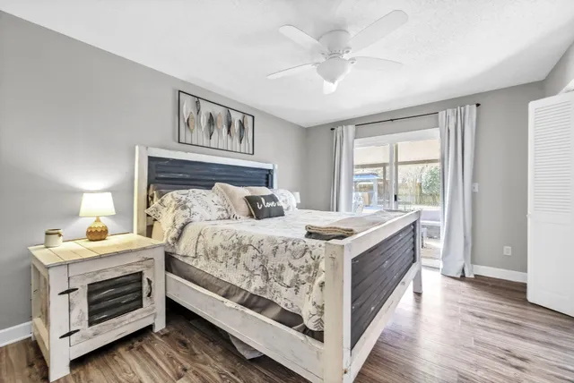 a bedroom with a bed and a fireplace