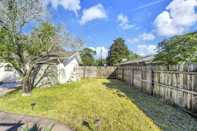 a house view with a outdoor space