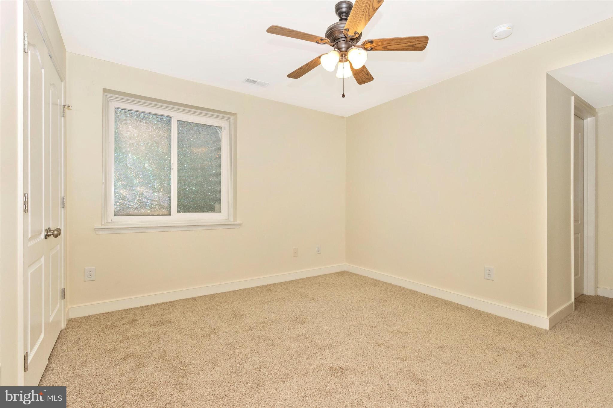 812 Crest Hill Road Severn, MD 21144 - Photo 40 of 55 Basement bedroom with new carpet