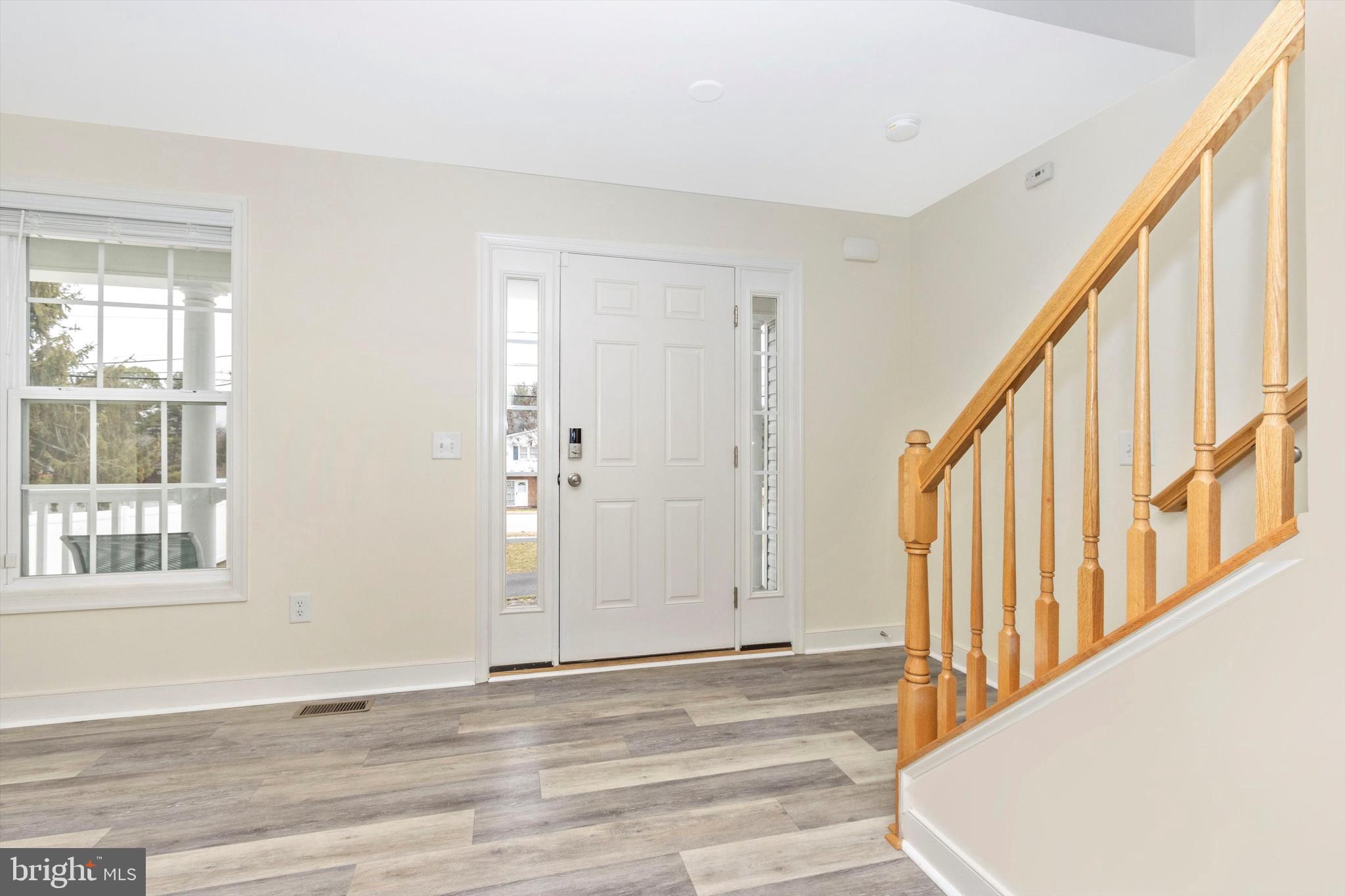812 Crest Hill Road Severn, MD 21144 - Photo 4 of 55 Luxury vinyl plank flooring on main level