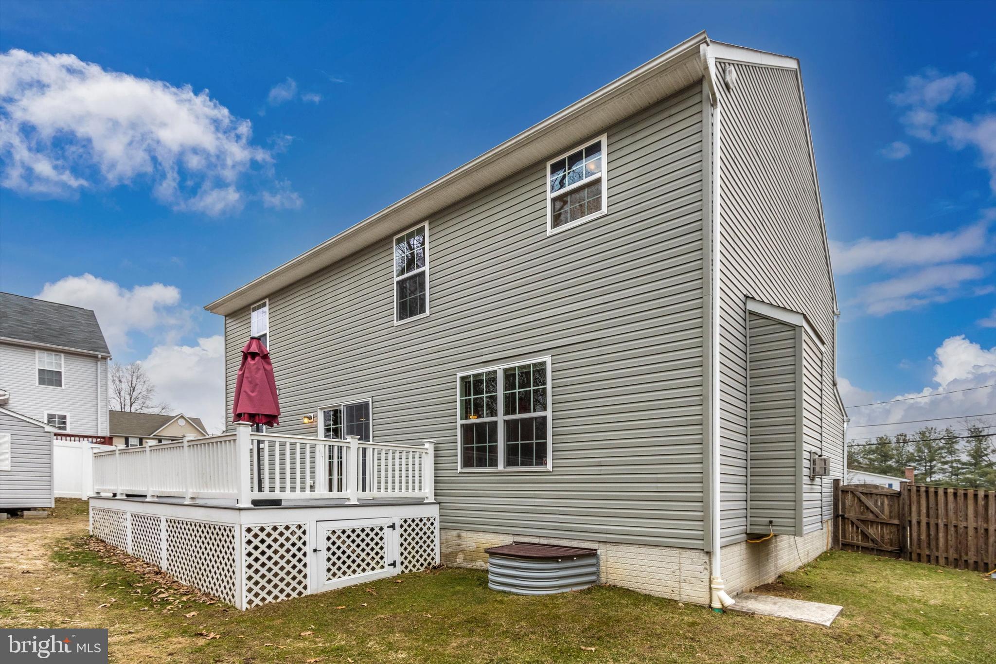 812 Crest Hill Road Severn, MD 21144 - Photo 50 of 55 Rear view with egress window well