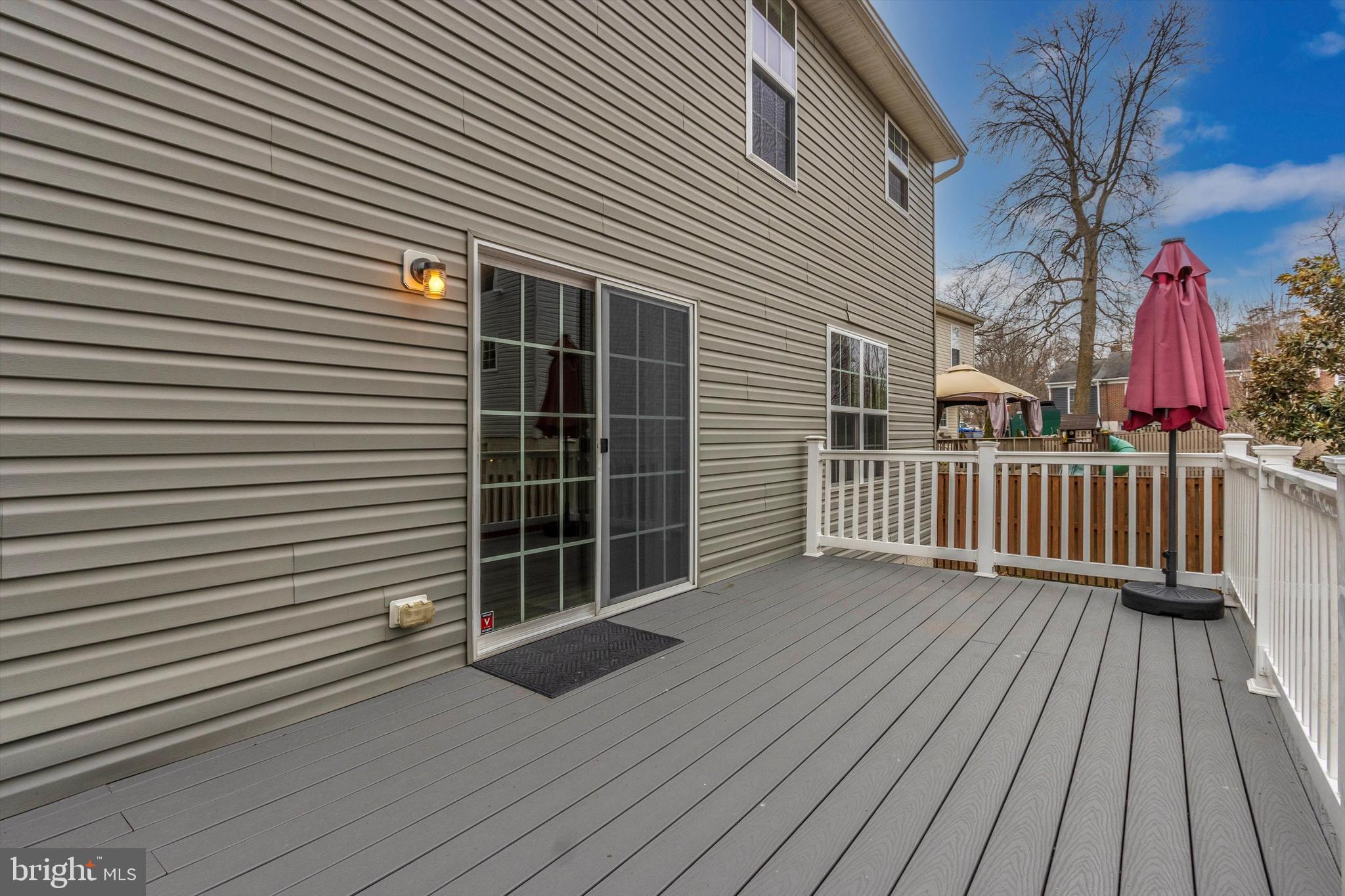 812 Crest Hill Road Severn, MD 21144 - Photo 51 of 55 Slider from kitchen to rear deck