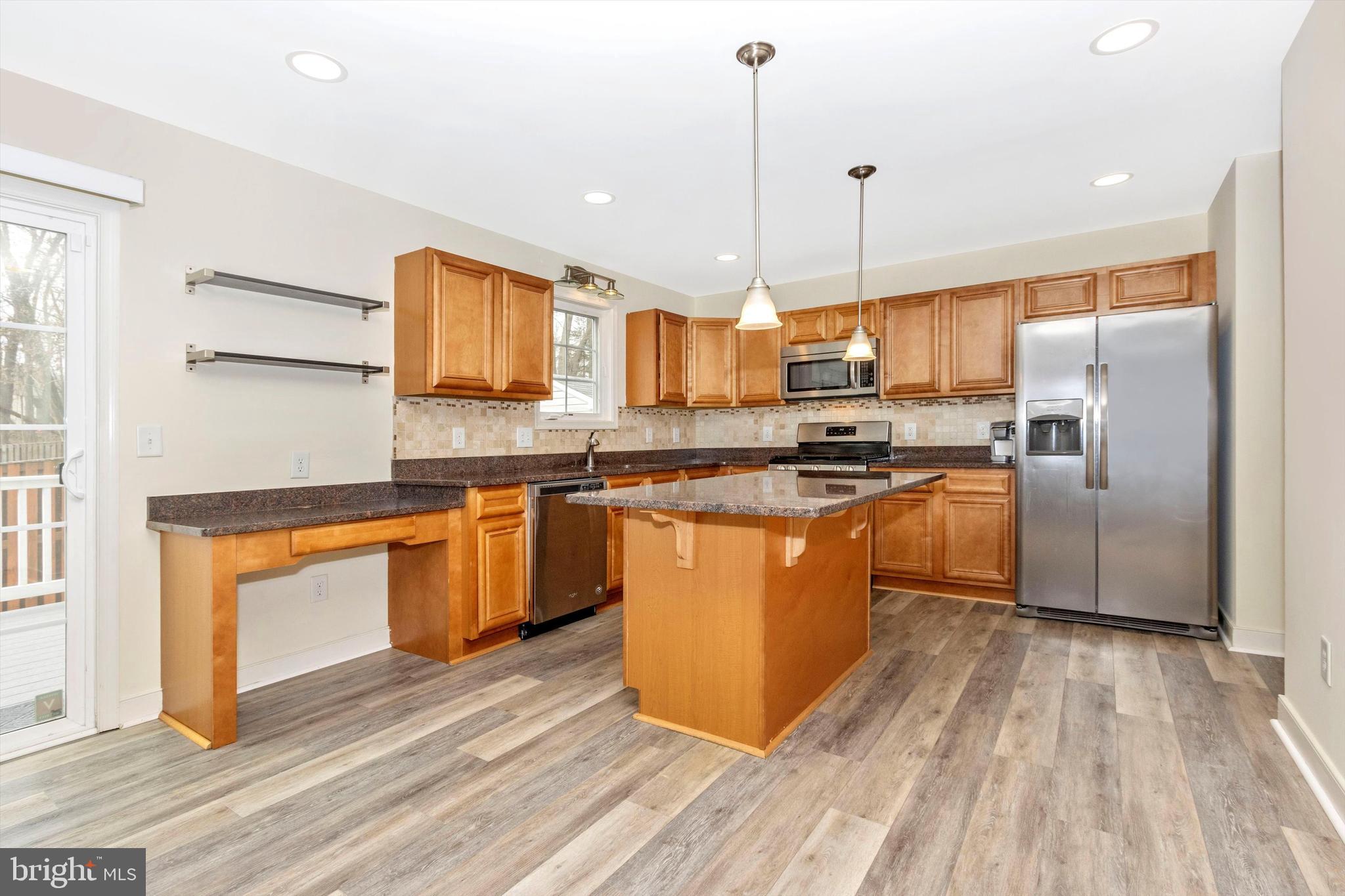 812 Crest Hill Road Severn, MD 21144 - Photo 9 of 55 Kitchen island with pendant lighting