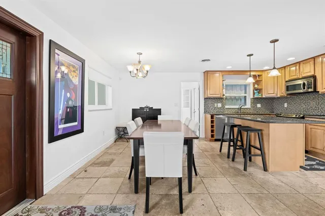a view of a dining room with furniture