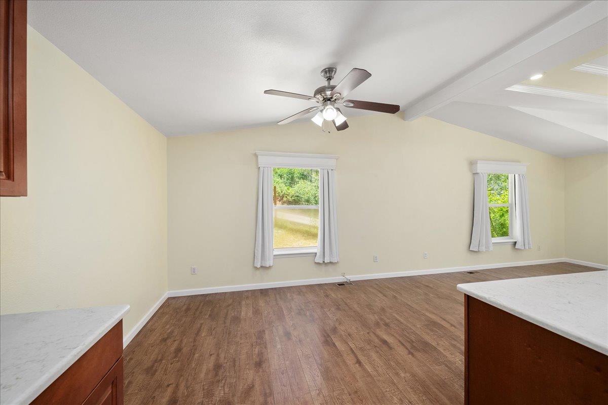 21819 Todd Valley Road Foresthill, CA 95631 - Photo 16 of 37 an empty room with windows and fan