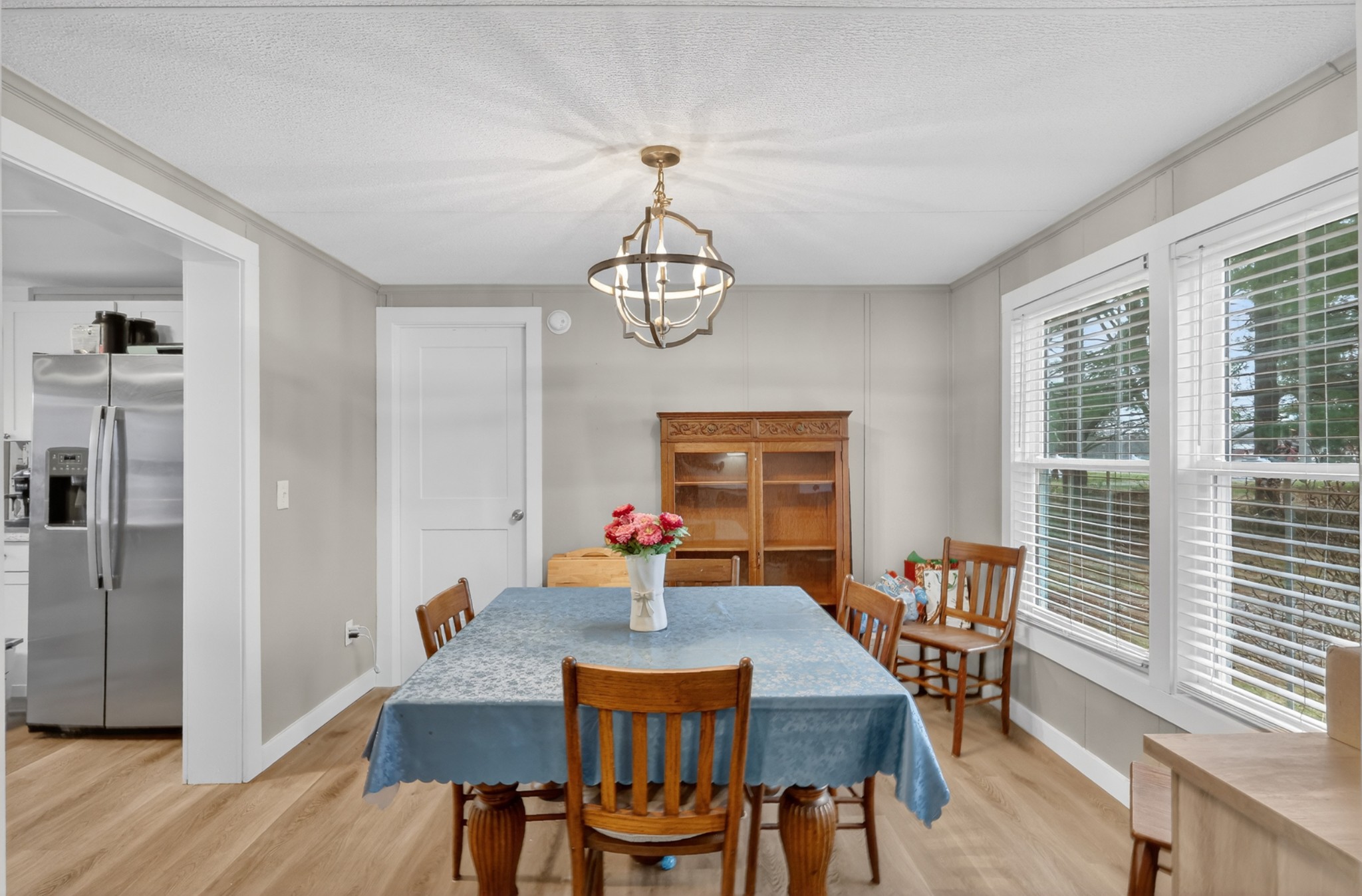 177 Mitchell Road Portland, TN 37148 - Photo 14 of 34 a view of a dining room with furniture window and wooden floor