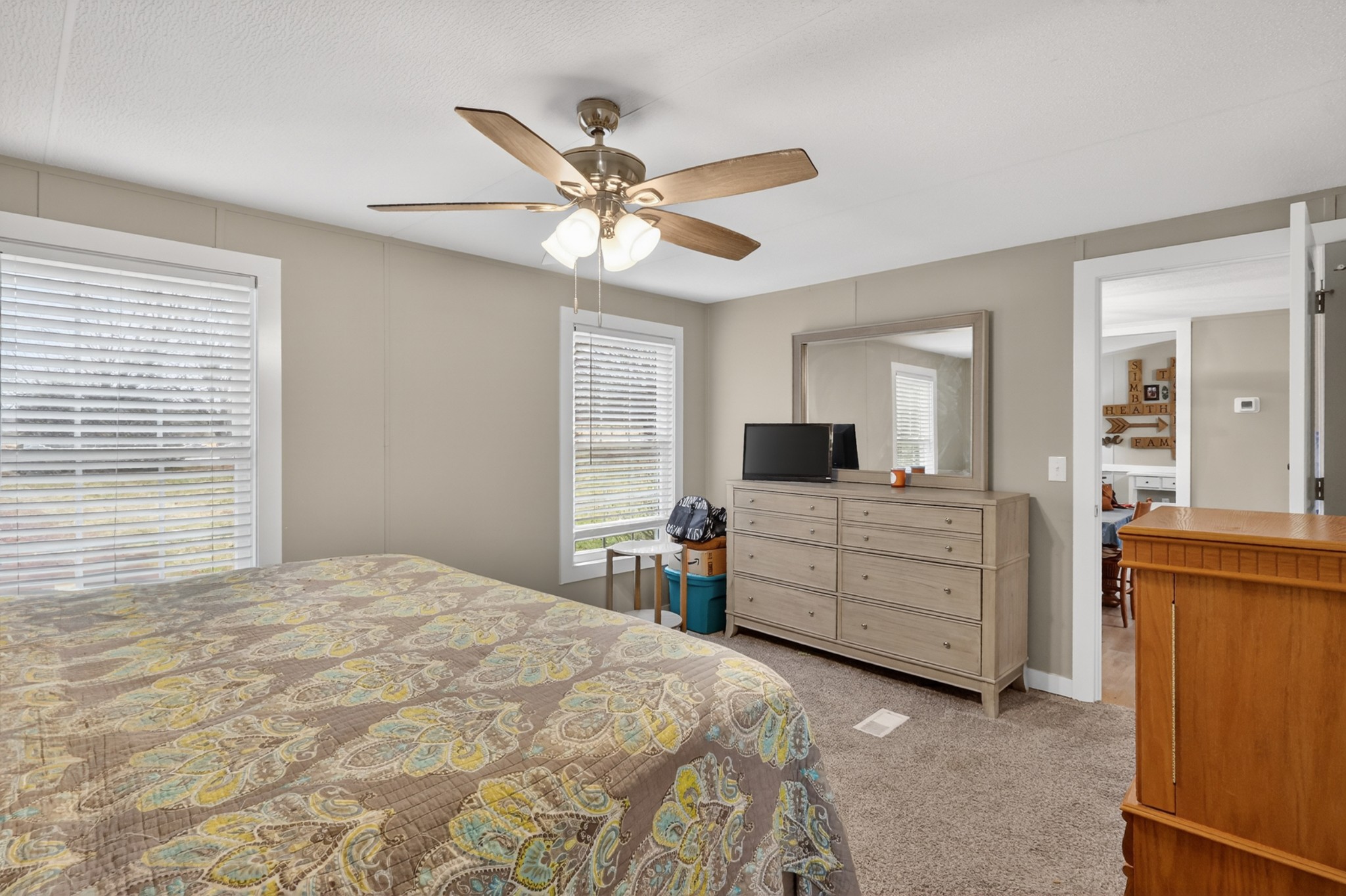 177 Mitchell Road Portland, TN 37148 - Photo 17 of 34 a bedroom with a bed and a dresser