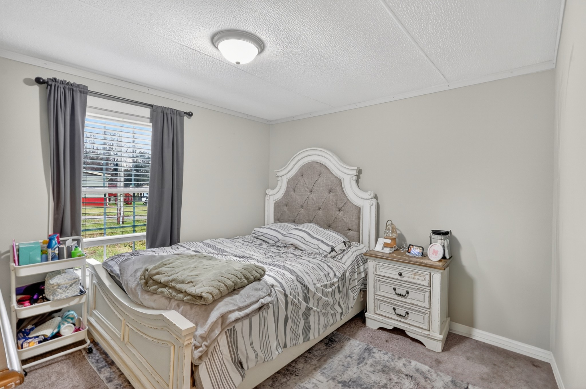 177 Mitchell Road Portland, TN 37148 - Photo 22 of 34 a bedroom with a bed and a dresser