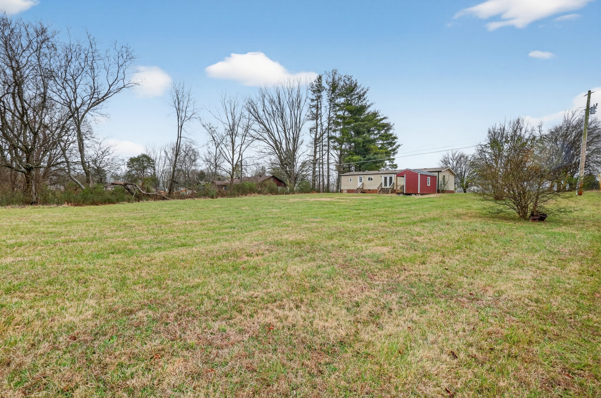 177 Mitchell Road Portland, TN 37148 - Photo 34 of 34 a view of a field with trees in the background
