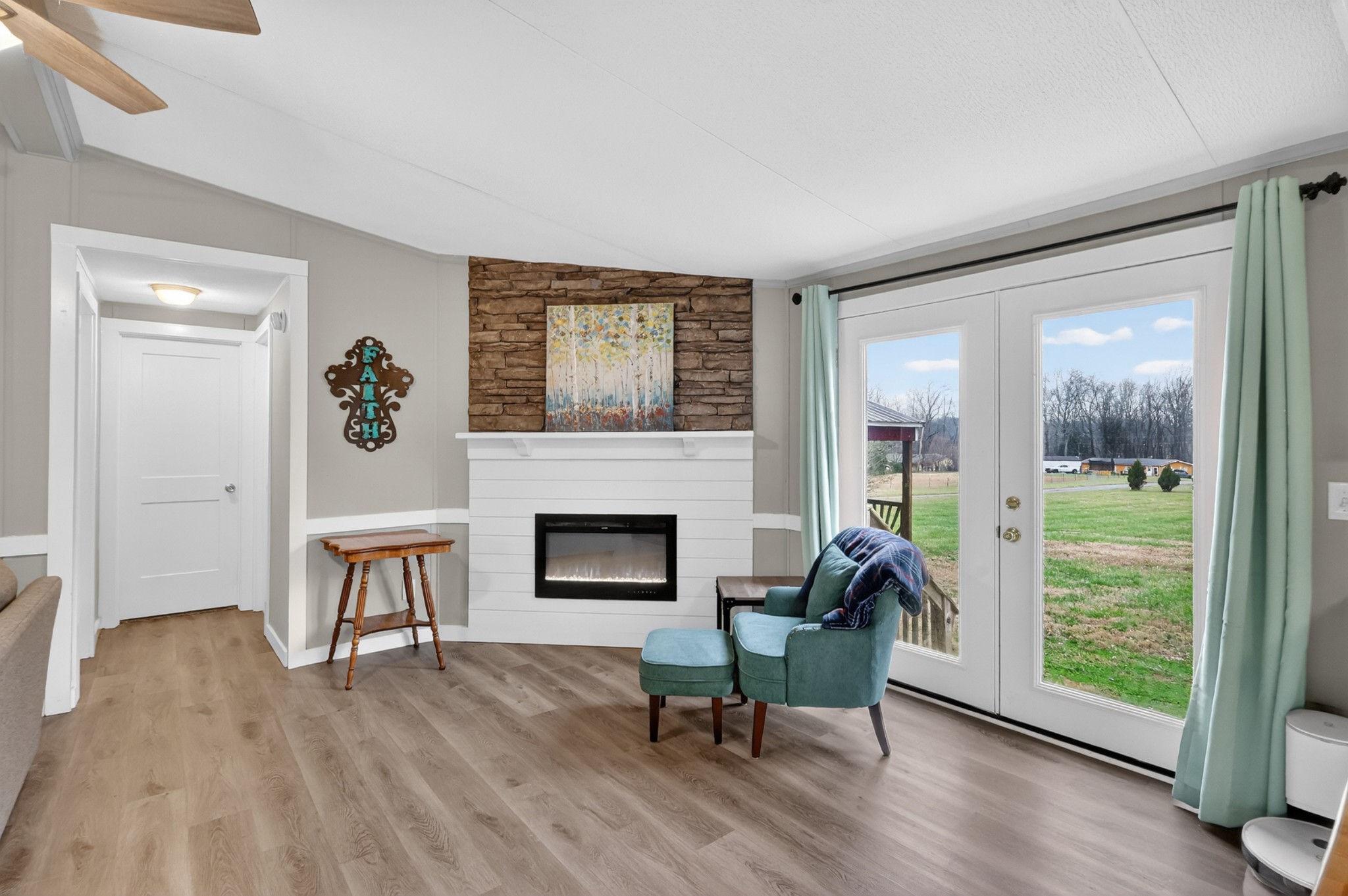 177 Mitchell Road Portland, TN 37148 - Photo 8 of 34 a living room with furniture and a fireplace