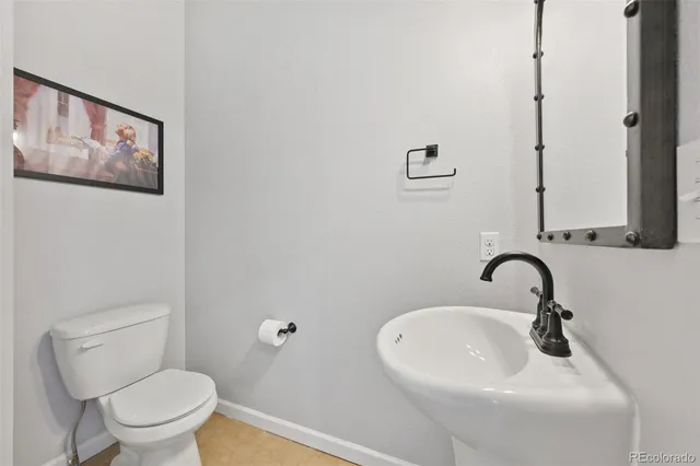 a bathroom with a sink and a toilet