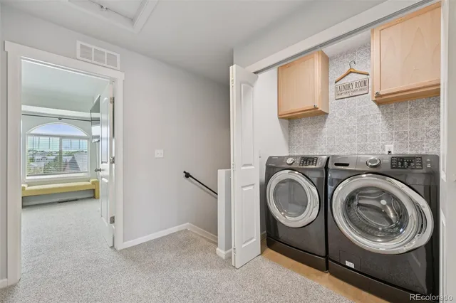a view of living room washer and dryer
