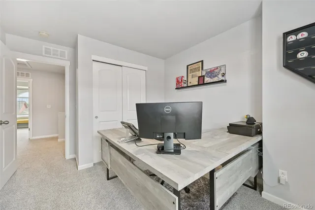 a room with furniture and flat screen tv