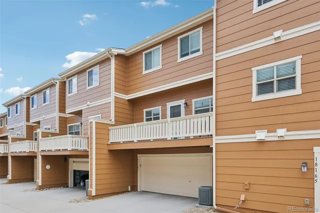 a picture of a room with a white wall and white kitchen
