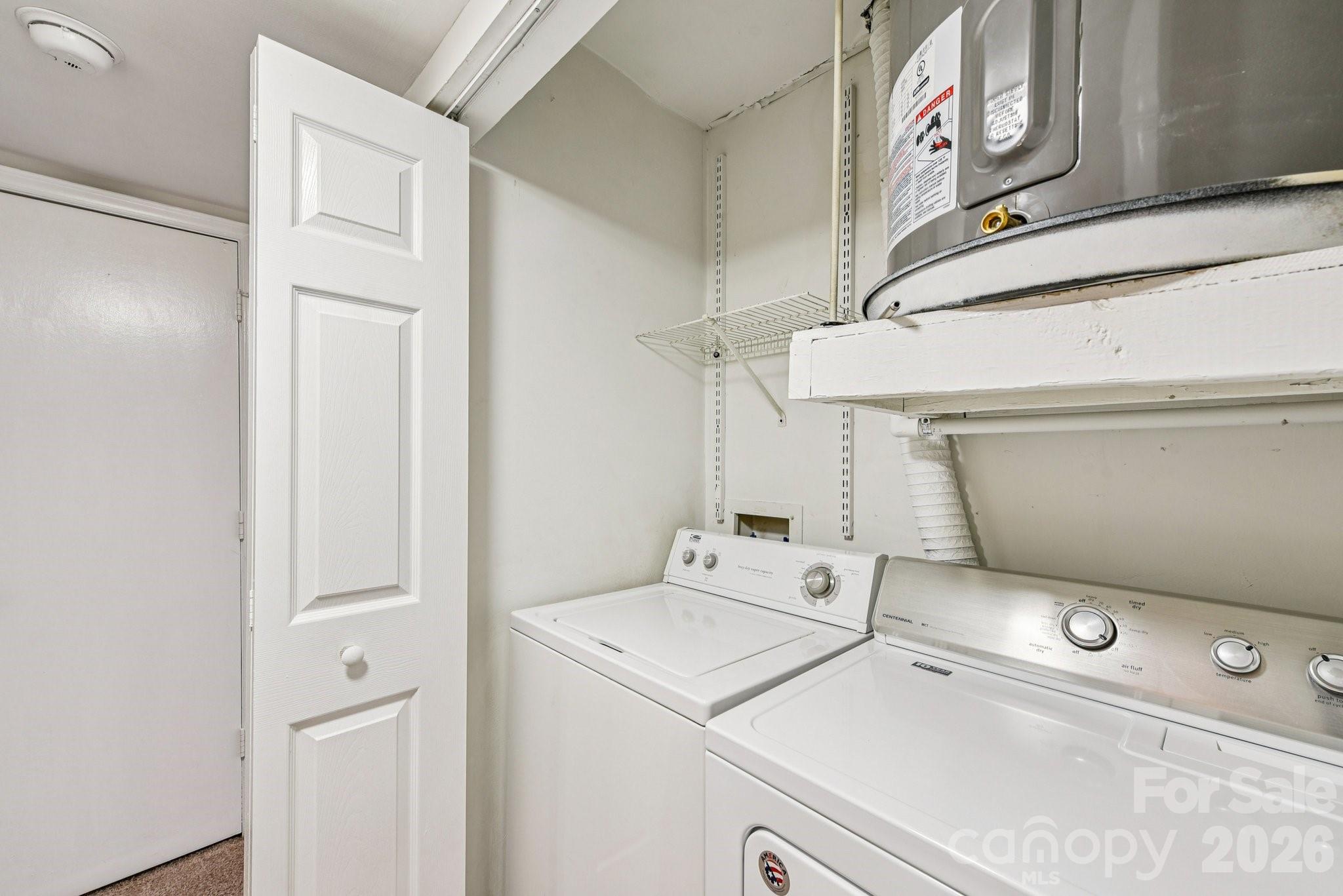 430 Queens Road, Unit 732 Charlotte, NC 28204 - Photo 16 of 17 a utility room with dryer and washer