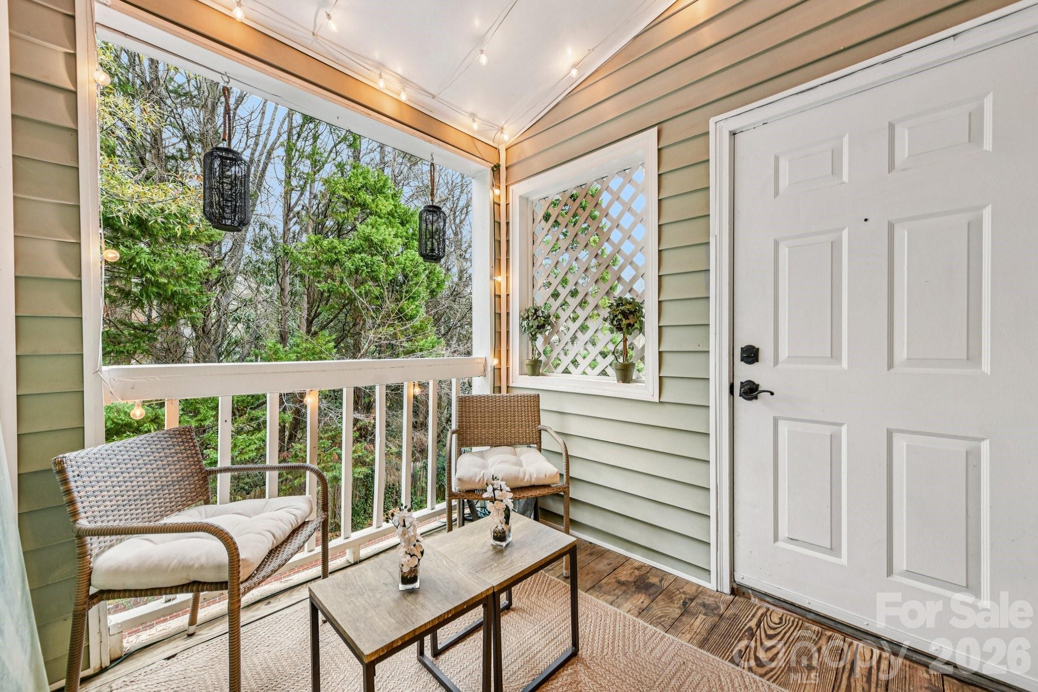 430 Queens Road, Unit 732 Charlotte, NC 28204 - Photo 4 of 17 a view of a two chairs in the balcony