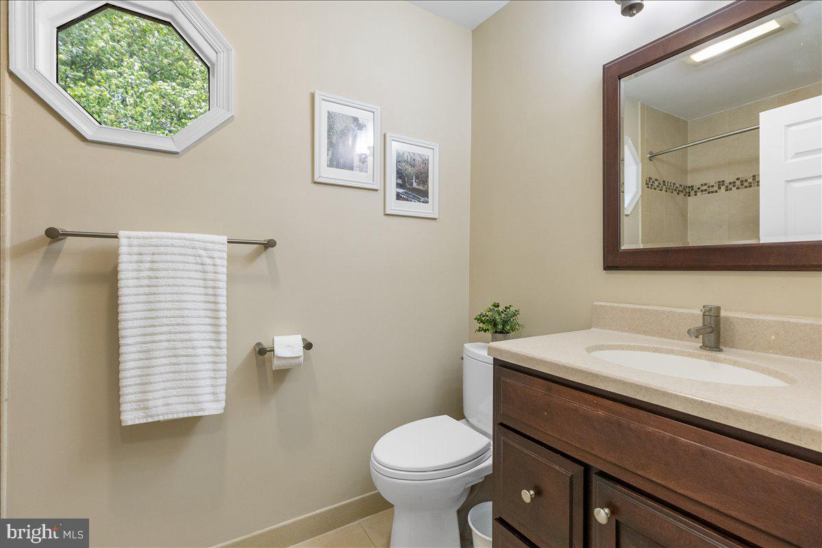3 Strathmore Place Princeton Junction, NJ 08550 - Photo 22 of 29 a bathroom with a toilet sink and mirror
