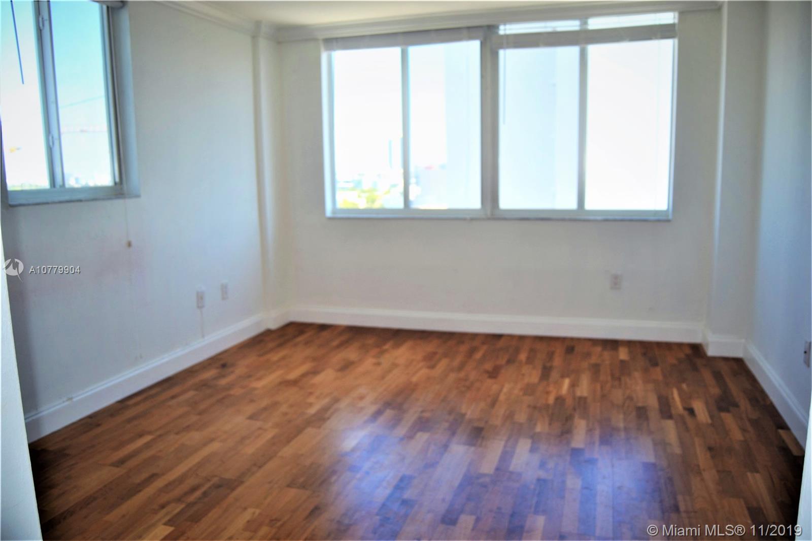 1345 Lincoln Road, Unit 1106 Miami Beach, FL 33139 - Photo 11 of 33 BEDROOM WITH NEW IMPACTED WINDOWS