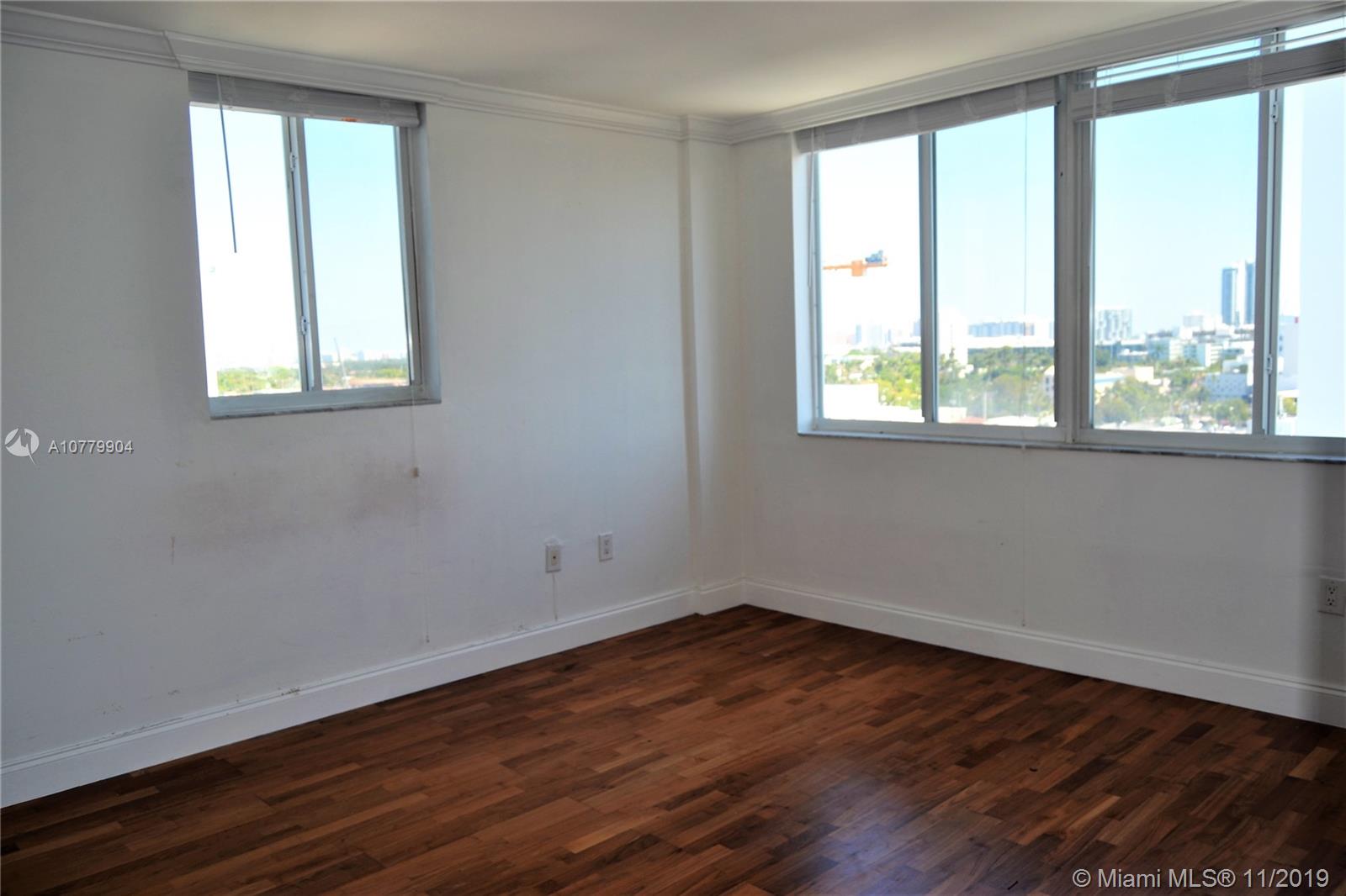 1345 Lincoln Road, Unit 1106 Miami Beach, FL 33139 - Photo 12 of 33 CORNER APARTMENT BEDROOM WITH A NORTH EAST VIEW