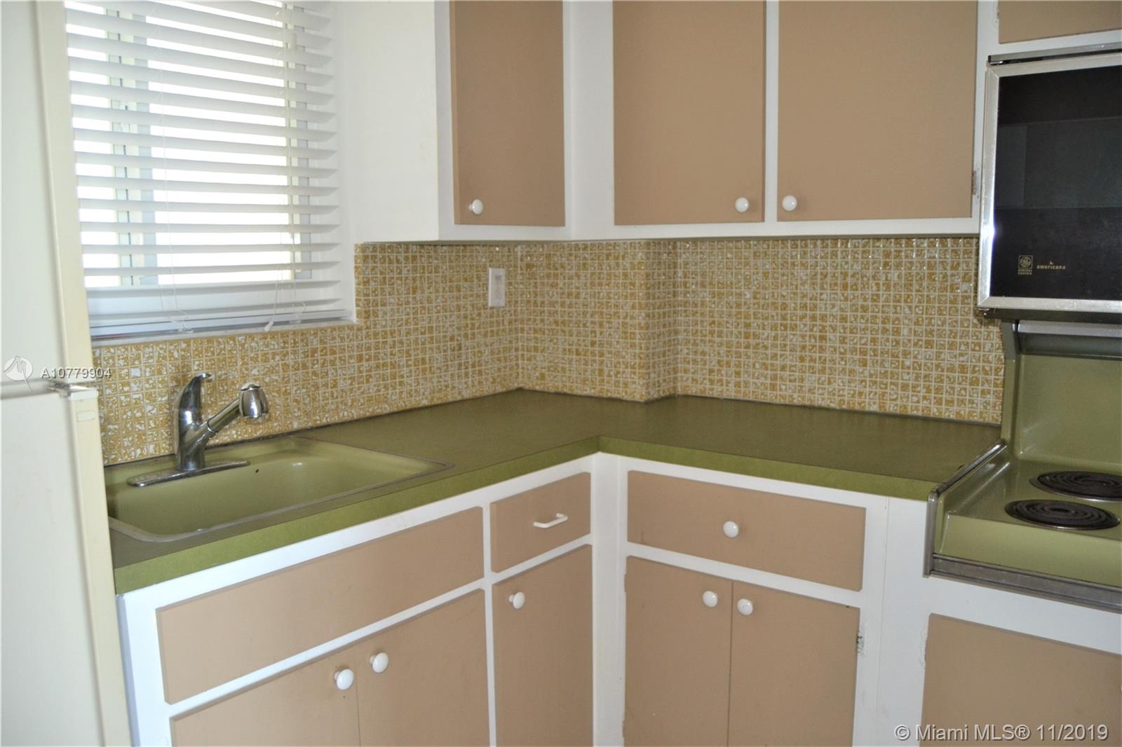 1345 Lincoln Road, Unit 1106 Miami Beach, FL 33139 - Photo 20 of 33 KITCHEN READY FOR UPGRADE WITH WINDOW FOR NATURAL LIGHT AND AIR