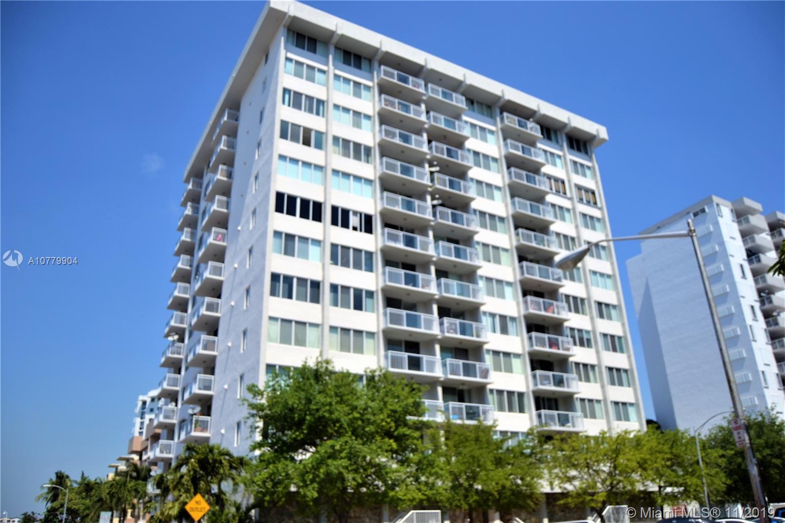 1345 Lincoln Road, Unit 1106 Miami Beach, FL 33139 - Photo 27 of 33 EXTERIOR OF 1345 LINCOLN RD