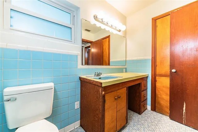 a view of yard with swimming pool and trees