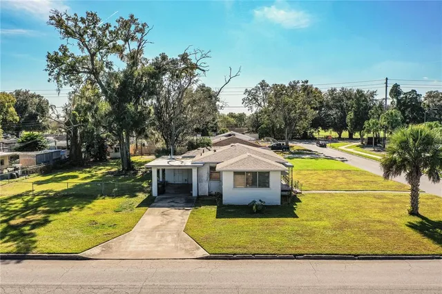 a front view of a house with swimming pool