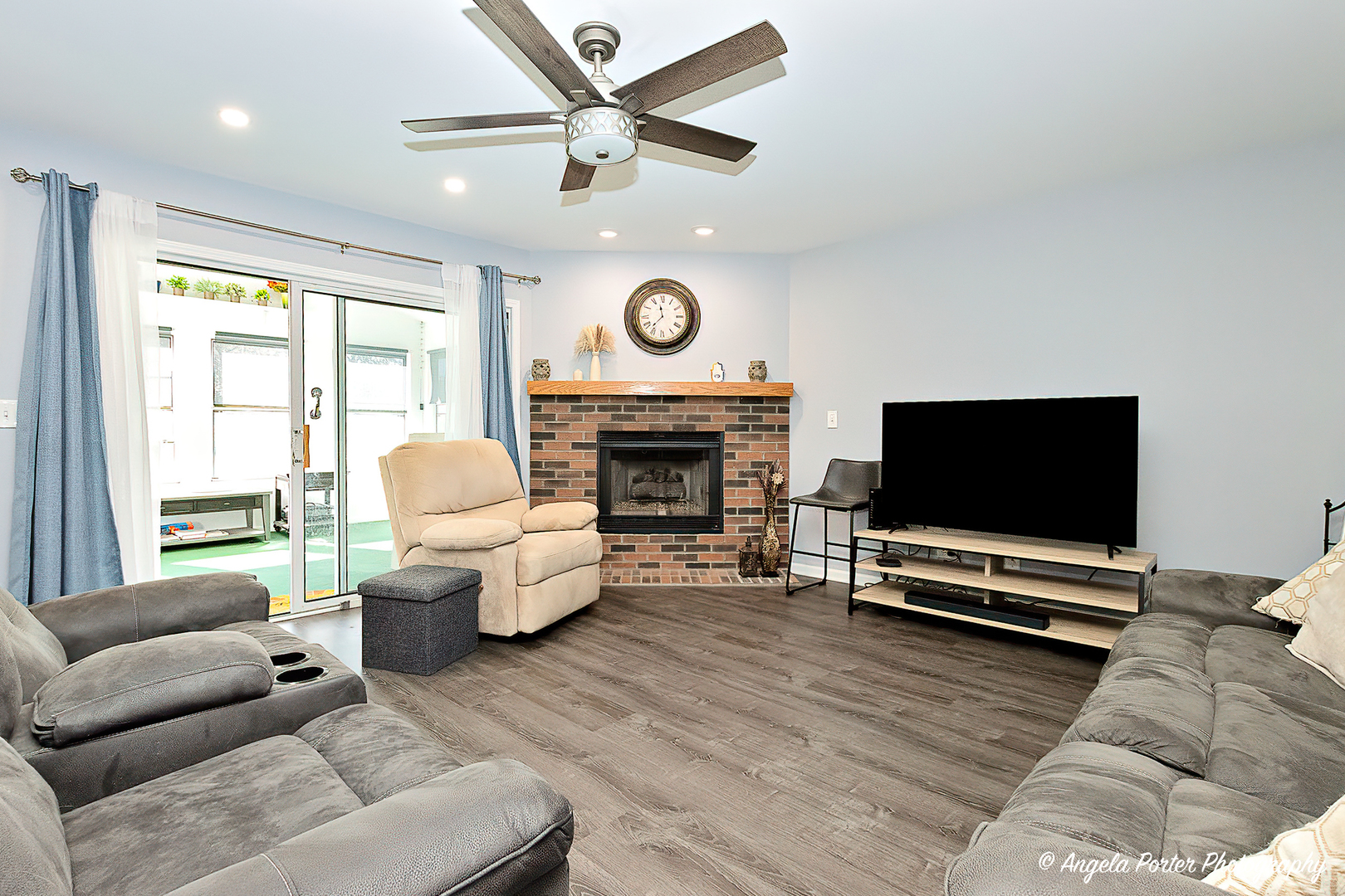337 Claire Lane Cary, IL 60013 - Photo 11 of 35 a living room with furniture and a flat screen tv
