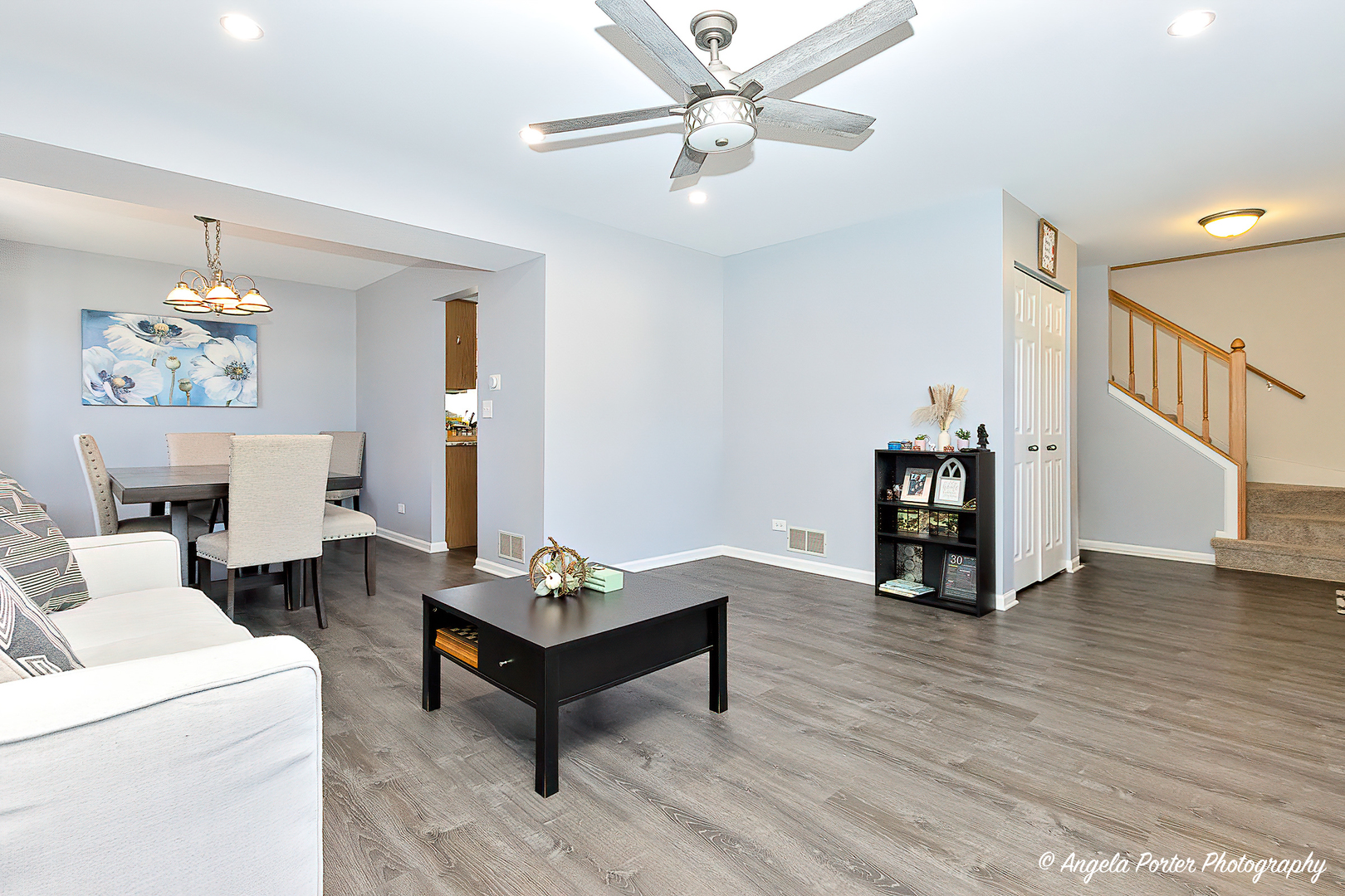 337 Claire Lane Cary, IL 60013 - Photo 15 of 35 a living room with furniture and a chandelier