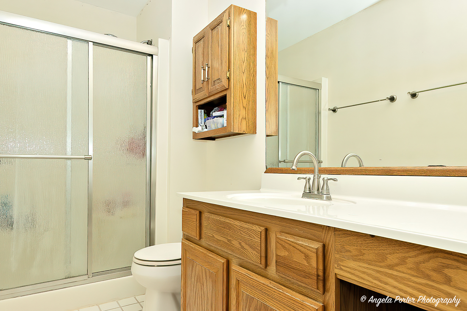 337 Claire Lane Cary, IL 60013 - Photo 24 of 35 a bathroom with a double vanity sink toilet and shower